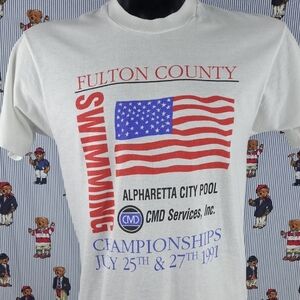 Vintage 1991 Fulton County Swim Championship Flag logo graphic white LG t-shirt